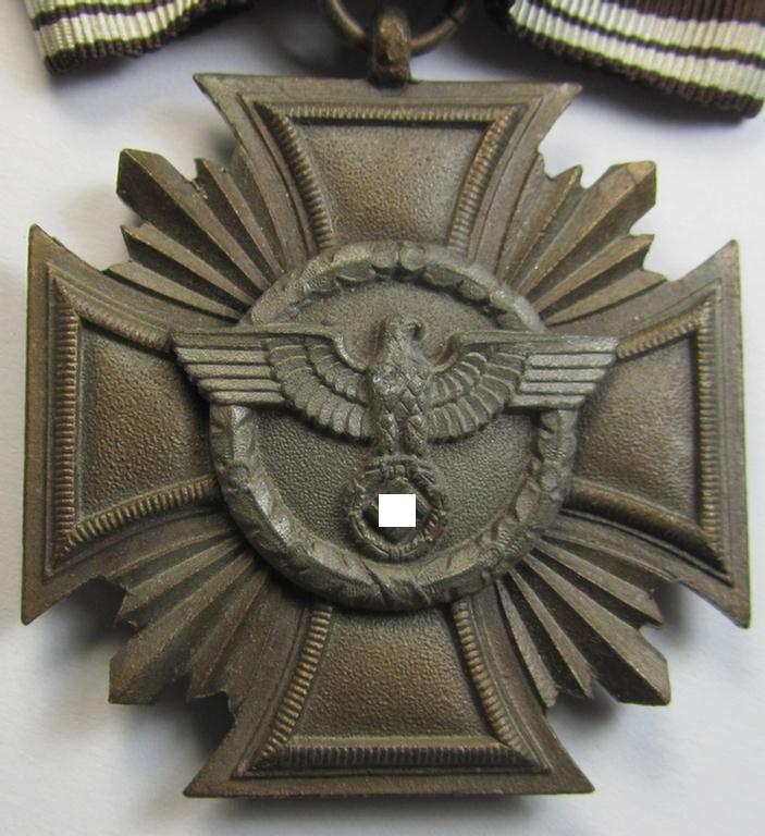 Superb, 'N.S.D.A.P. Dienstauszeichnung in Bronze' (ie. being of the '3. Stufe für 10 Jahre treue Dienste') being a non-maker-marked- (and 'heavy-weight'!) example that comes mounted onto its female-related ribbon (ie. 'Bandabschnitt')
