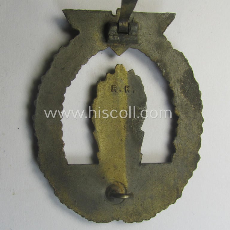 WH (Kriegsmarine) 'Kriegsabzeichen für Minensuch-, U-Boot-Jagd und Sicherungs-Verbände' being a detailed and clearly maker- (ie. 'R.K.') marked, 'Feinzink'-based example as was produced by the 'Rudolf Karneth'-company
