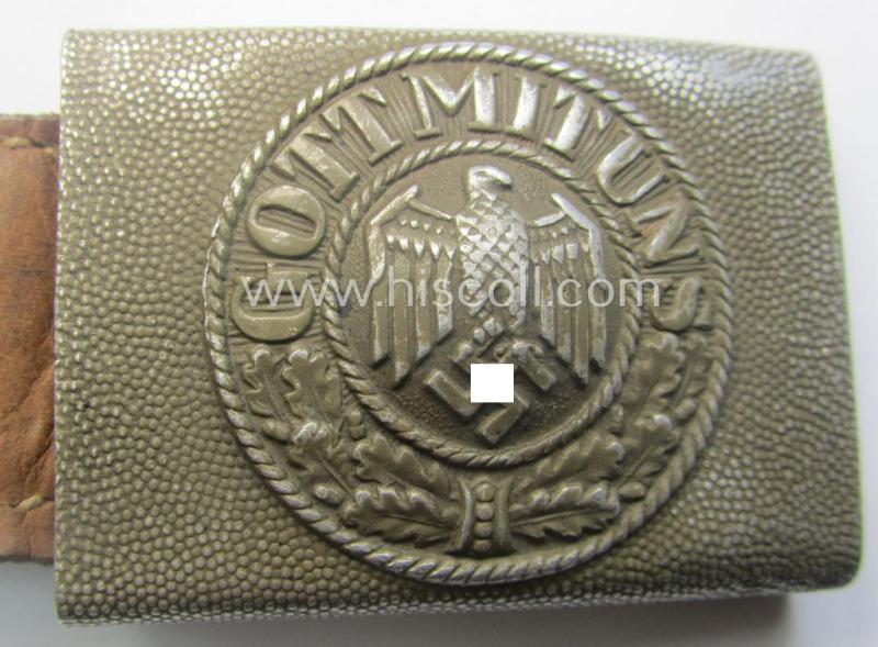 WH (Heeres) 'standard-pattern', field-grey-toned- and aluminium-based belt-buckle being a maker- (ie. 'H. Arld - Nuernberg'-) marked- and/or: '1937'-dated example that comes mounted onto its leather-based tab