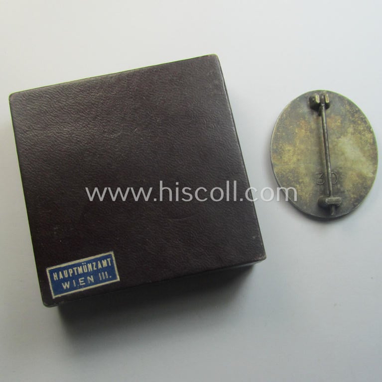 'Verwundeten-Abzeichen in Silber' being a clearly maker- (ie. '30'-) marked- and/or typical 'Feinzink'-based example that comes stored in its maker- (ie. 'Hauptmünzamt Wien III'-) marked- and period etui