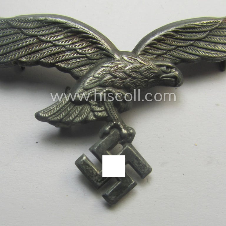 Minimally worn, WH (Luftwaffe) EM/NCO-pattern visor- (ie. 'Schirmmützen'-) cap-eagle being a non-maker-marked example as executed in zinc- ('Feinzink'-) based metal