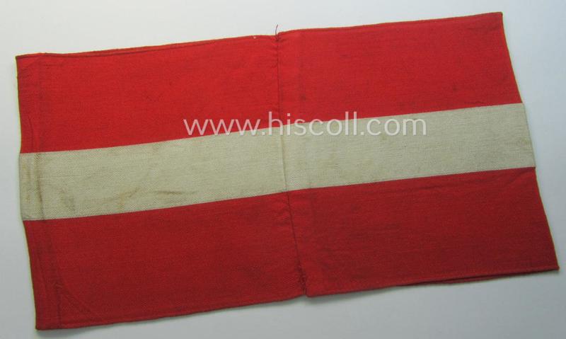 'Standard-issued'-pattern (ie. entirely woven) pattern, bright-red-coloured HJ- (ie. 'Hitlerjugend'-) related armband (ie. 'Armbinde') being a moderately worn- ie. used example that misses its 'RzM'-etiket