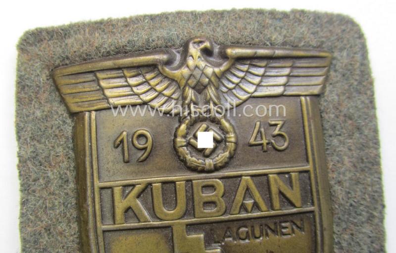 WH (Heeres ie. Waffen-SS) 'Kuban'-campaign-shield that comes mounted onto its original field-grey-coloured- and/or woolen-based 'backing'