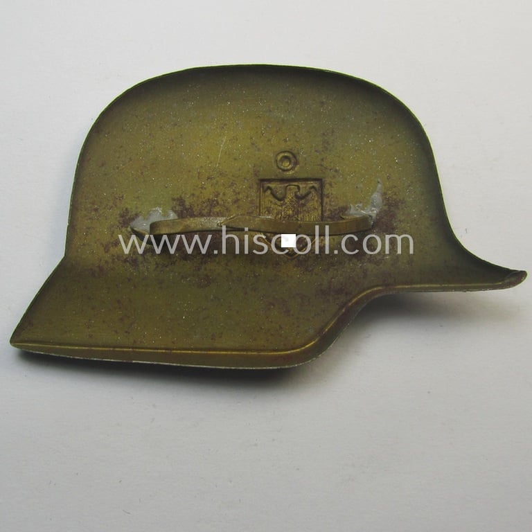 Silverish-grey-coloured- (and I deem tin-based) WH (Heeres) related so-called: 'photo-album-device' depicting a German steel-helmet (with attached decal!) and being a non-maker-marked example