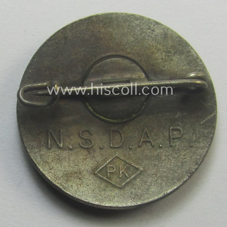 Neatly enamelled, 'N.S.D.A.P.'-related membership-pin- ie. party-badge (aka: 'Opferring der Freiheitsbund der N.S.D.A.P.') showing on its back the text: 'N.S.D.A.P.' coupled with the makers'-designation: 'PK'