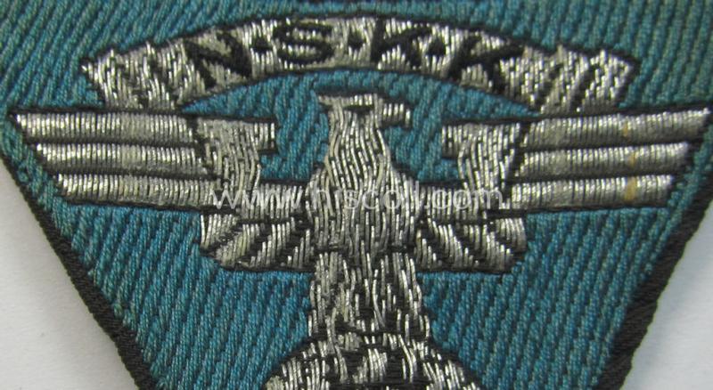 Attractive, so-called: N.S.K.K. (ie. 'National Socialistisches Kraftfahr Korps') side-cap-eagle (ie. 'Adler für N.S.K.K.-Schiffchen o. Lagermütze') being a 'flat-wire-woven'-example onto a bright-blue-coloured background