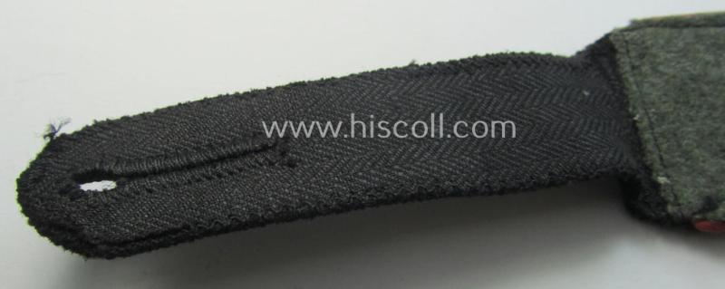 Attractive - albeit regrettably single! - Waffen-SS, EM-type shoulderstrap as piped in the bright-pink-coloured branchcolour as was intended for usage by an: 'SS-Mann' who served within the: 'SS-Panzer-Truppen'