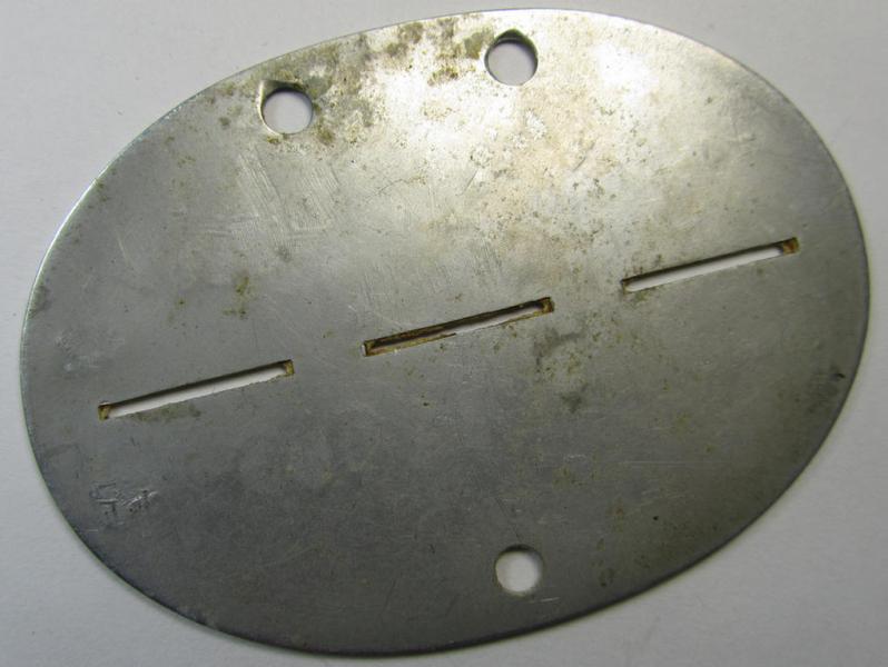Aluminium-based, WH (Heeres-) ie. 'Infanterie'-related ID-disc bearing the clearly stamped unit-designation: '1.J.E.Btl. 469' and that comes as issued- and/or worn