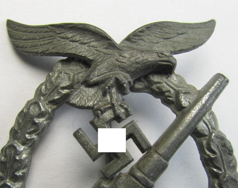 Attractive - and just moderately used! - 'Feinzink'-based example of a WH (Luftwaffe) 'Flakkampfabzeichen' (or: airforce anti-aircraft badge) being a very detailed albeit non-maker-marked example as was produced by the: 'E. Ferd. Wiedmann'-comp...