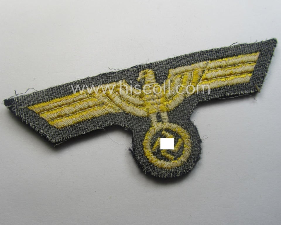 WH (Kriegsmarine) breast-eagle (ie. 'Brustadler für Mannschaften u. Uffz. der Kriegsmarine') being a 'standard-pattern'- and neatly machine-embroidered example that comes in a never used- ie. still 'virtually mint', condition