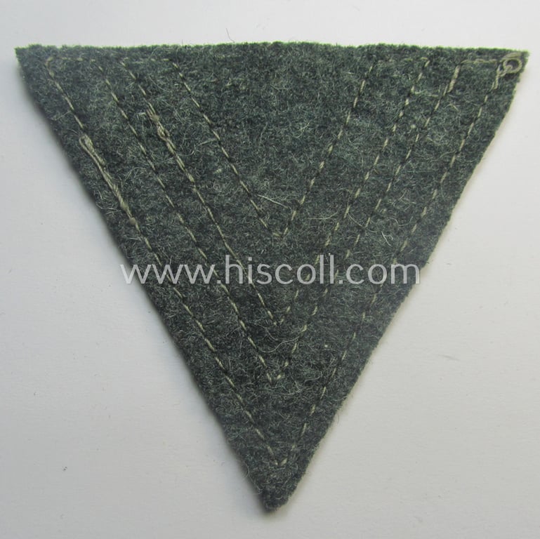 WH (Heeres) 'Armwinkel' (or: arm-chevron) as executed on typical field-grey-coloured wool as was specifically intended for usage by a soldier with the rank of: 'Obergefreiter'