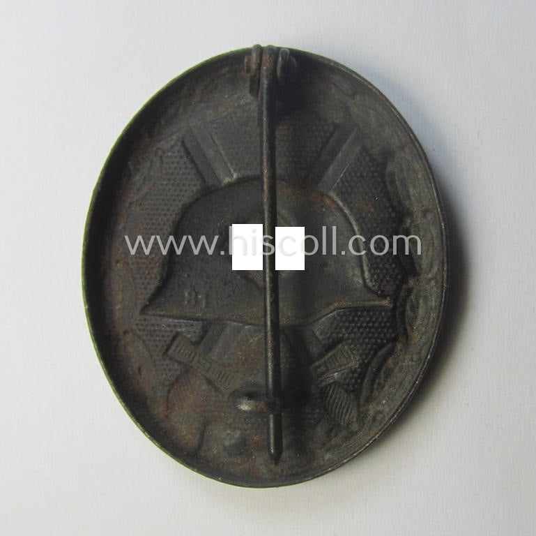 Neatly maker- (ie. '81'-) marked example of a black-class wound-badge (or: 'Verwundeten-Abzeichen in Schwarz') being an example that was produced by the maker (ie. 'Hersteller') named: 'Overhoff & Cie.'