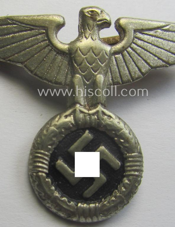 Silver-toned - and I deem 'Buntmetall'-based - early-pattern, SS- o. SA-type, political- ie. 'Art Deco'-styled visor- (ie. 'Schirmmützen'-) cap-eagle being a maker-marked (ie. 'RzM 2?'-) marked example