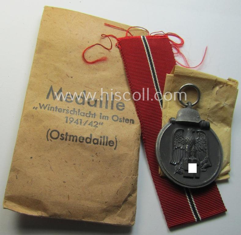 Superb medal-set: 'Winterschlacht im Osten 1941/42' as produced by the: 'Deschler u. Sohn'-company (being a non-maker-marked specimen that came stored in its original 'Zellstoff'-based pouch of issue as found)