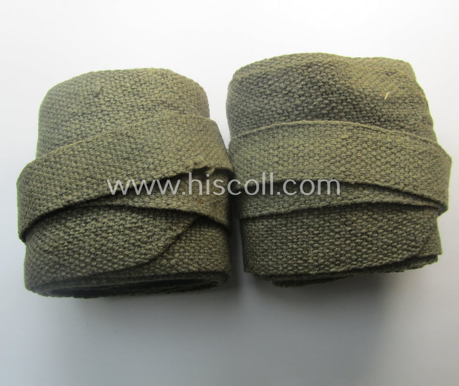 Attractive - and fully matching! - pair of 'standard-issued', WH (Heeres etc.) greenish-tan-coloured- and/or fine-woolen-based, so-called: 'Wickel-Gamaschen' (ie. puttees) being both non-maker-marked examples that come in a moderately used condition