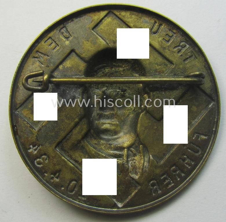 Commemorative, N.S.D.A.P.-related 'tinnie' or day-badge being a non-maker-marked example depicting detailed illlustration of 'Adolf Hitler' coupled with the text: 'Treu dem Führer - 20.4.34'