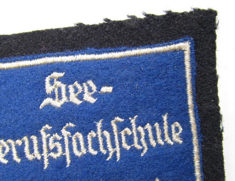 Superb - and with certainty very rarely encountered! - Marine-HJ (ie. 'Marine-Hitlerjugend') arm-badge (aka: 'Ärmelabzeichen') depicting the embroidered text: 'Seeberufsfachschule Wesermünde'