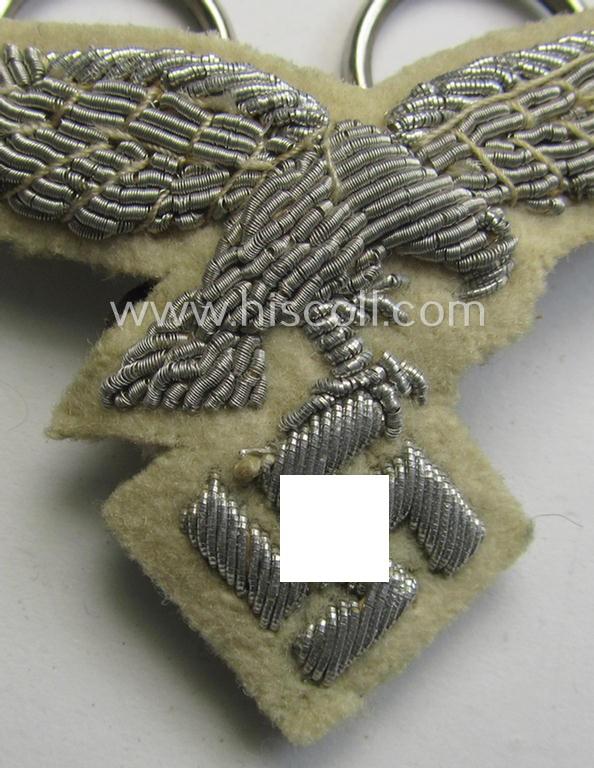 Superb - and rarely seen! - WH (Luftwaffe) officers'-type visor-cap eagle that is neatly hand-embroidered on beige-white-coloured wool as was specifically used for the white-topped LW officers'-type visor-caps (ie. 'Sommer-Schirmmützen')