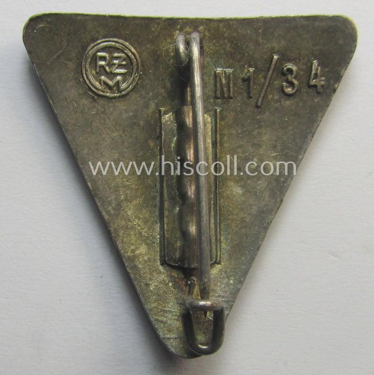 'NS-Frauenschaft'- (ie. NSF-) membership-badge (ie. 'Mitgliedsabz.') as was intended for a: 'Mitglied des engeren Stab der Ortsleitung' (and that shows an: 'RzM M1/34'-designation)