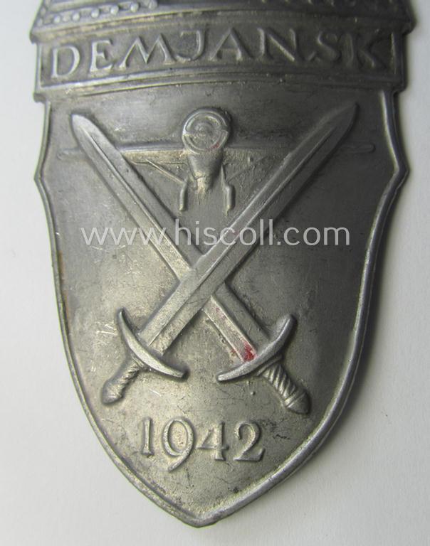 Nicely preserved - albeit regrettably incomplete ie. relic! - example of a WH (Heeres ie. Waffen-SS) 'Demjansk'-campaign-shield as executed in typical magnetic, so-called: 'Eisenblech'