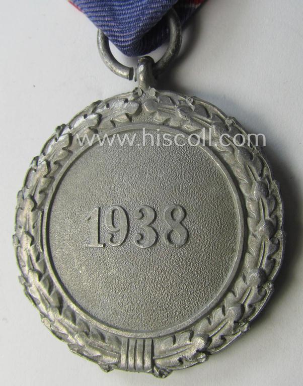 Neat, 'Luftschutz-Ehrenzeichen 2. Stufe' being a non-maker-marked example as executed in (light-weight) aluminium-based metal and that comes mounted onto its period (confectioned) ribbon ie. 'Bandabschnitt'