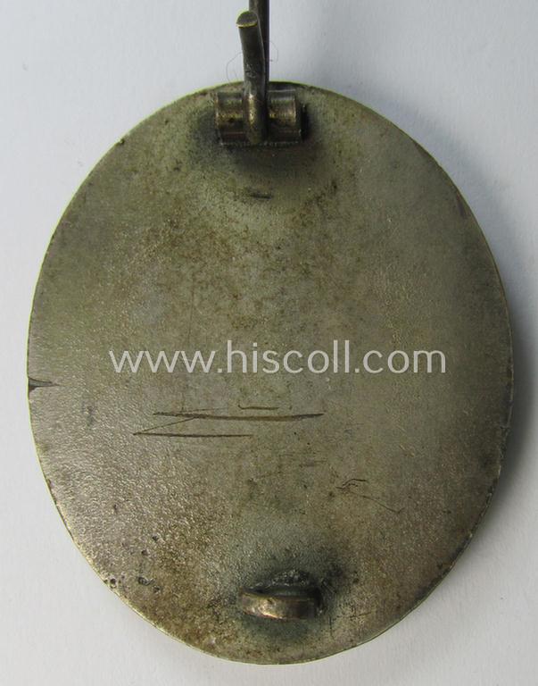 Attractive - and luxuriously-styled! - example of a: 'Verwundeten-Abzeichen in Silber' being a clearly maker- (ie. '4'-) marked, 'Buntmetall'-based example by the maker (ie. 'Hersteller') named: 'Steinhauer & Lück'