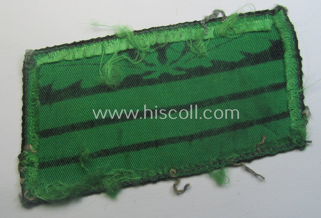 Attractive - clearly used albeit regrettably single! - officers'-pattern, WH (Heeres o. Waffen-SS) rank-insignia-bar (for usage on the camouflaged-uniforms) as used by an officer holding the rank of: 'Hauptmann' (ie.: 'SS-Hauptsturmführer')