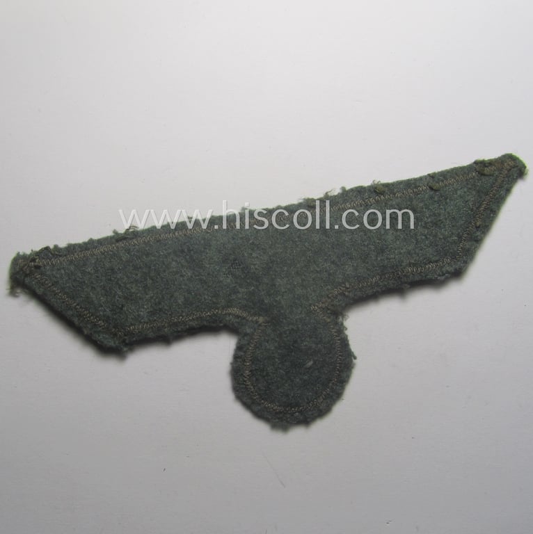 WH (Heeres) breast-eagle as executed in 'BeVo'-type-, so-called: 'flat-wire'-weave-pattern and pre-mounted on field-grey-coloured wool as was specifically intended for usage by soldiers (ie. NCOs) on their dress-tunics (ie. 'Waffenröcke')