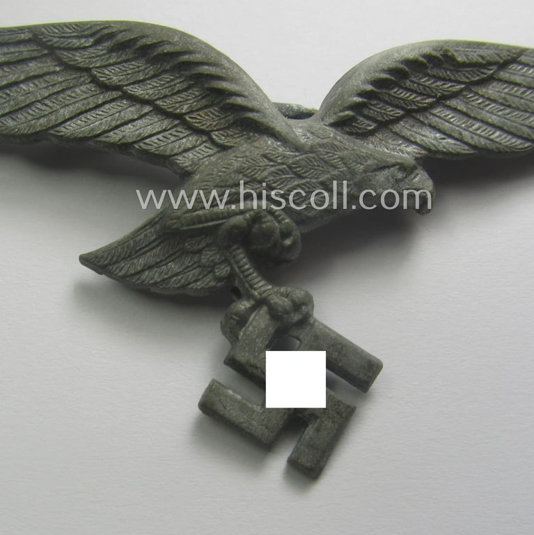 Never worn, WH (Luftwaffe) EM/NCO-pattern visor- (ie. 'Schirmmützen'-) cap-eagle being a non-maker- marked example as executed in zinc-based metal