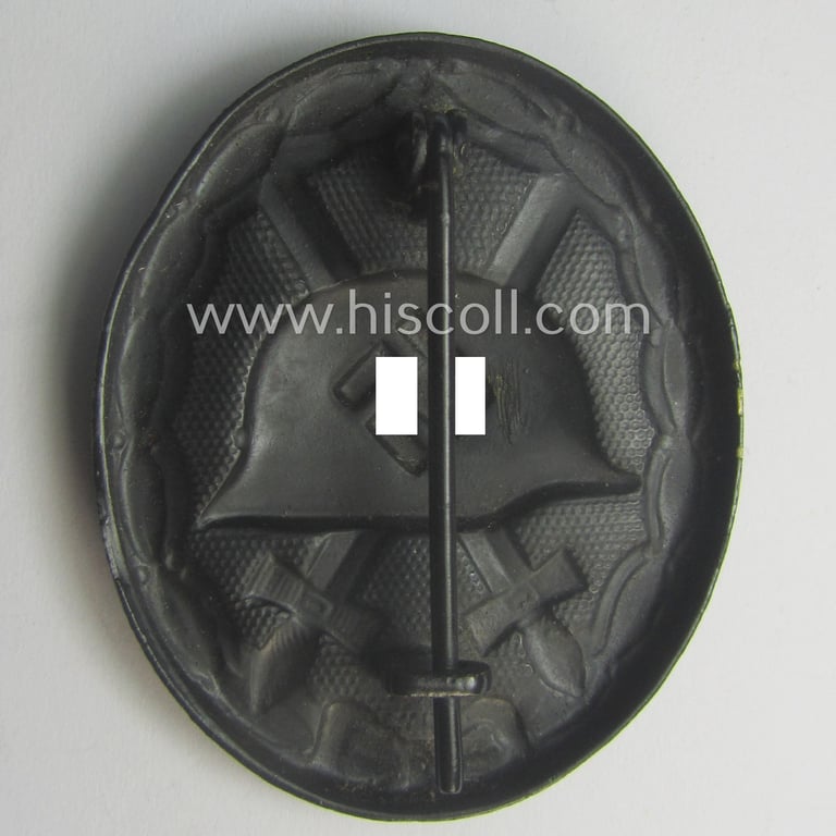 Hardly used- nor worn (ie. 'virtually mint- ie. unissued'!) example of a black-class wound-badge (or: 'Verwundeten-Abzeichen in Schwarz') being a typical non-magnetic and/or non-maker-marked example