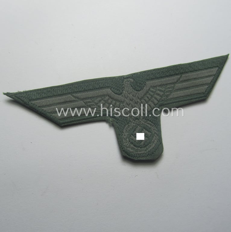 Early- (ie. mid-) war-period, WH (Heeres) cap-eagle & cocarde-set (ie. 'Schiffchenmützen-Adler u. Kokarde-Satz für Mannschaften u. Uffz.') being a 'virtually mint' set as executed in bluish-grey-coloured linnen on a field-grey-coloured background