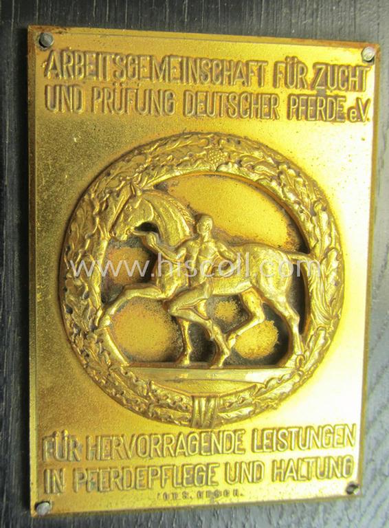 Attractive - and scarcely encountered! - bright-golden-toned 'Erinnerungs- o. nichttragbare Auszeichnungsplakette' showing a golden-class 'Pferdepleger-Abzeichen' that comes mounted onto a wooden-based 'standard'