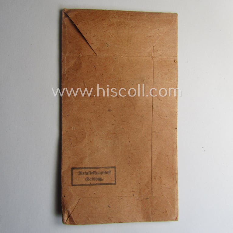 Empty 'Zellstoff'-based pouch as was intended for a medal: 'Winterschlacht im Osten 1941/42' as was produced by the company: 'Metall-Kunststoff - Gablonz'