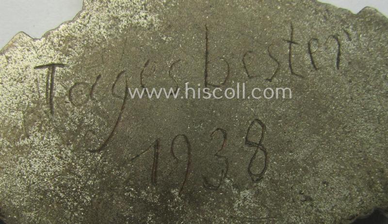 Most certainly unusually found, silver-toned (and neatly enamelled!) commemorative shooting-contest-medal that shows the period-engraved text: 'Tagesbester 1938'