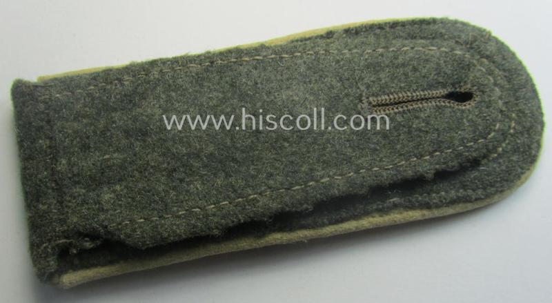 Single, WH (Heeres) NCO-type (ie. 'M40'- ie. 'M43'-pattern) shoulderstrap having the white-coloured branchcolour as was intended for - and clearly worn by! - an: 'Oberfeldwebel der Infanterie-Trpn.'