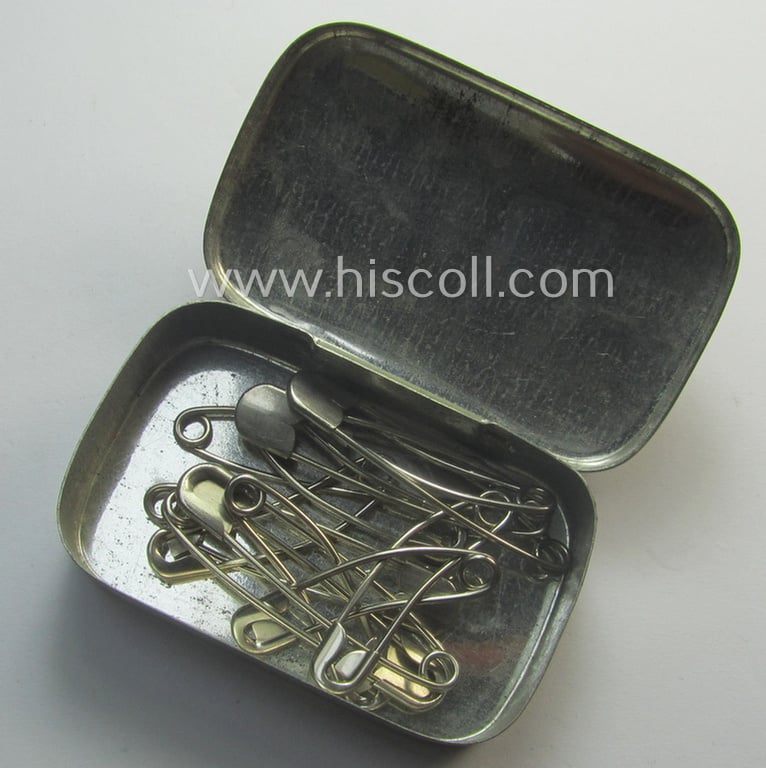 Smaller-sized, WH ie. 'DRK' (ie. 'Deutsches Rotes Kreuz' or: German Red-Cross) greyish-coloured- and/or: tin-based box as was intended for storage of needles ('Nadeln') that comes with its period contents