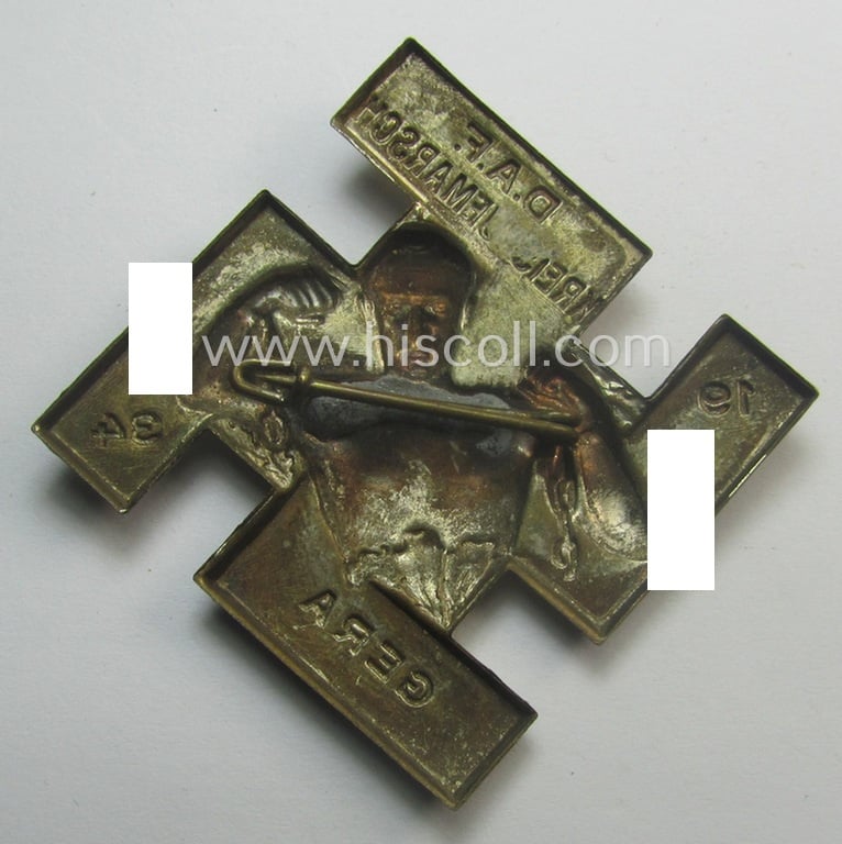 Fairly early-period, silver-toned D.A.F.- (ie. 'Deutsches Arbeitsfront'-) related day-badge (ie. 'tinnie' or: 'Veranstaltungsabzeichen') as was issued to commemorate the: 'D.A.F.-Kreisaufmarsch - Gera - 1934'
