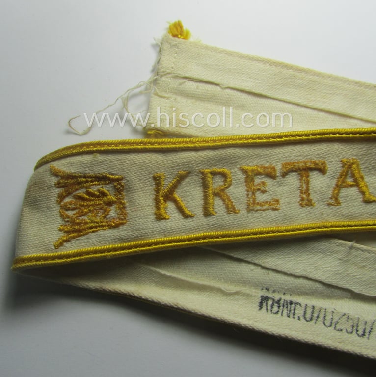WH cuff-title (ie. 'Ärmelstreifen') entitled: 'Kreta' (being an example that bears a printed 'RbN.'-numeral) and that comes in a surely issued albeit simply never worn nor once tunic-attached, condition