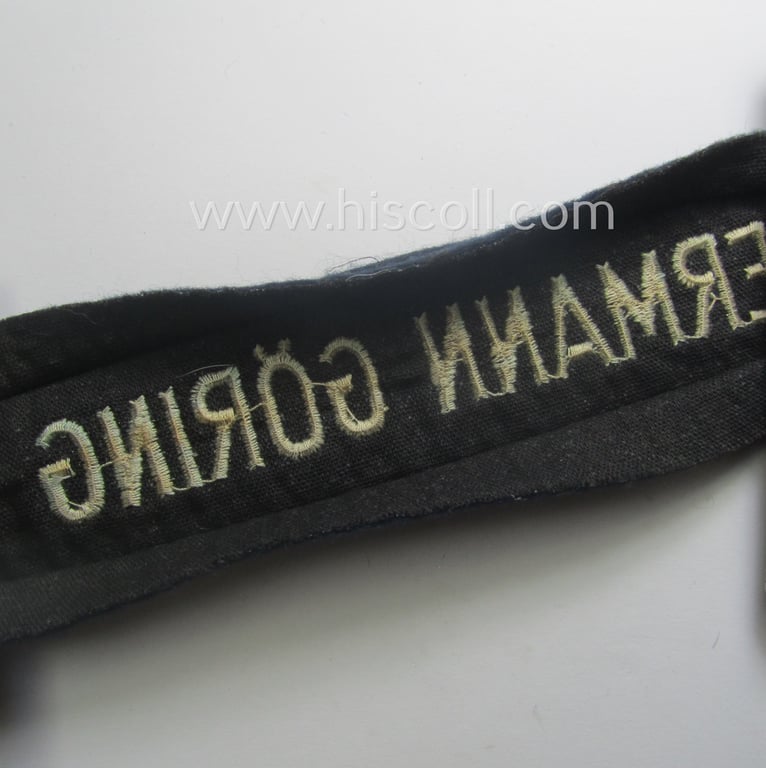 Truly used- and/or tunic-removed, typical 'smooth-woolen'-based, EM- (ie. NCO-) pattern WH (Luftwaffe) cuff-title (ie. 'Ärmelstreifen') entitled: 'Hermann Göring' that comes in that comes in an overall very nice condition