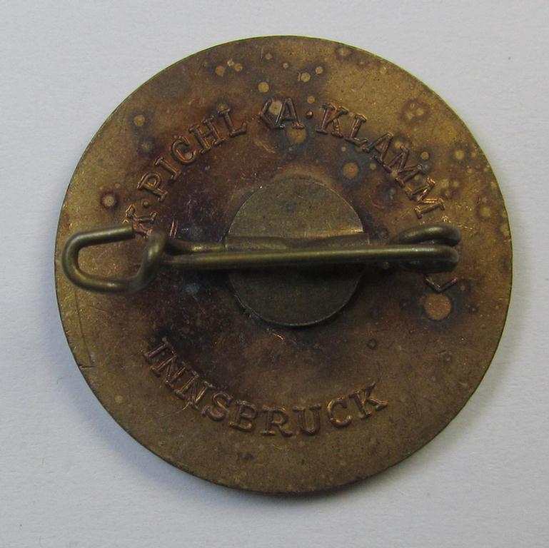 Attractive - and truly unusally seen! - red-coloured enamelled, smaller-sized, so-called: 'Gauleistungsabzeichen in Bronze für Kombinationsschiessen 1941 des Standschützenverbandes Tirol-Vorarlberg'