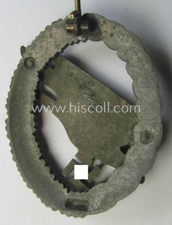 Regrettably incomplete, WH (Luftwaffe) 'Fallschirmschützen-Abzeichen' (or: paratroopers-jumpbadge) being a neatly maker- (ie. 'B&N - L'-) marked- and typical zinc- (ie. 'Feinzink'-) based example by the maker: 'Berg u. Nolte'