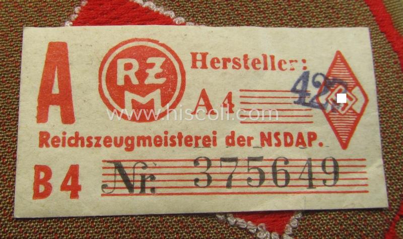 Attractive, DJ (ie. 'Deutsches Jungvolk') arm-badge as was intended for usage by a member who served within the: 'Oberbann 1' (being a 'virtually mint- ie. unissued' example that still retains its 'RzM'-etiket)