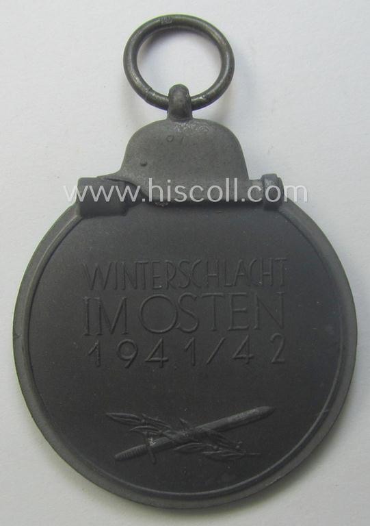 Medal-set: 'Winterschlacht im Osten 1941/42' as produced by the: 'Förster & Barth'-company being a clearly maker- (ie. '10'-marked) specimen that came stored in its original 'Zellstoff'-based pouch of issue as found