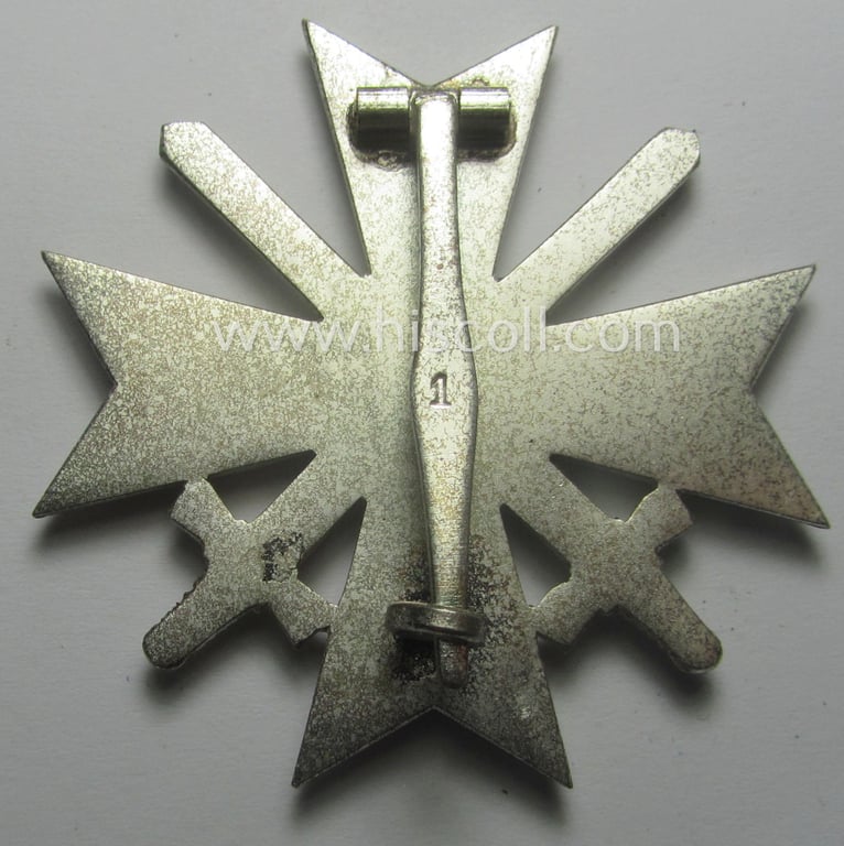 Luxuriously-styled! - 'KvK 1. Klasse mit Schwertern' being an attractive and maker- (ie. '1'-) marked specimen that is executed in typical, silverish-coloured metal (ie. 'Buntmetall') and that comes in a wonderful condition