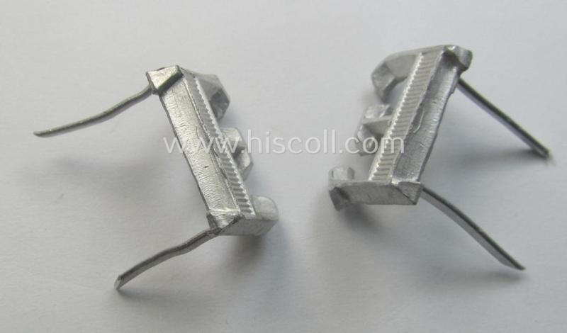 Pair of NCO-type- (thus silver-coloured), Waffen-SS- (ie. SS-VT-) related shoulderstrap-cyphers (ie. 'Schulterstückauflagen o. Ziffern') depicting a capital 'E'-character for usage by an NCO serving within the: 'Ergänzungsstellen der Waffen-SS'