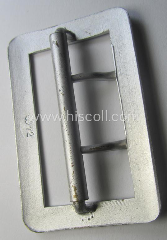 Interesting, WH (Heeres-, Luftwaffe ie. Waffen-SS etc.) bright-silver-coloured WH-officers'-type-belt-buckle (ie. 'Zweidornschnalle für Offiziere') being a simply never used- nor worn example that shows the makers'-designation: 'RzM 72'