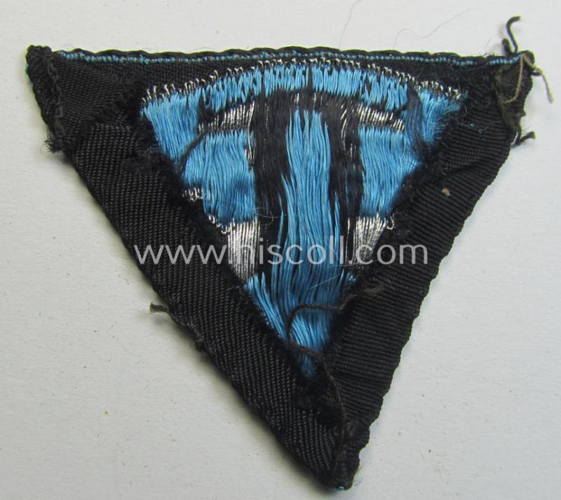 Neat - and clearly used! - so-called: N.S.K.K. (ie. 'National Socialistisches Kraftfahr Korps') side-cap-eagle (ie. 'Adler für N.S.K.K.-Schiffchen o. Lagermütze') being a 'flat-wire-woven'-example onto a bright-blue-coloured background