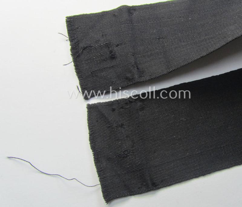 WH (Heeres) related cuff-title (ie. 'Ärmelstreifen') being a typical black-coloured- and linnen-based example showing the (neatly silver-toned- and 'flatwire'-woven!) text that reads: 'Propagandakompanie'