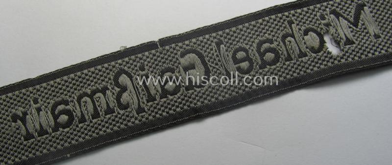 Truly used and/or worn - albeit regrettably somewhat damaged! - Waffen-SS cuff-title (ie. 'Ärmelstreifen') as executed in neat 'BeVo'-weave pattern as intended for a member serving within the: 'SS-Geb.Jäger-Regiment 12' - "Michael Gaißmair"