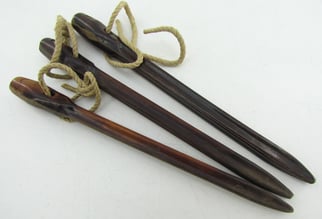 Matching set of 3 Bakelite tent pegs